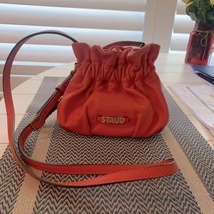 Excellent condition tangerine color mini grace bucket bag